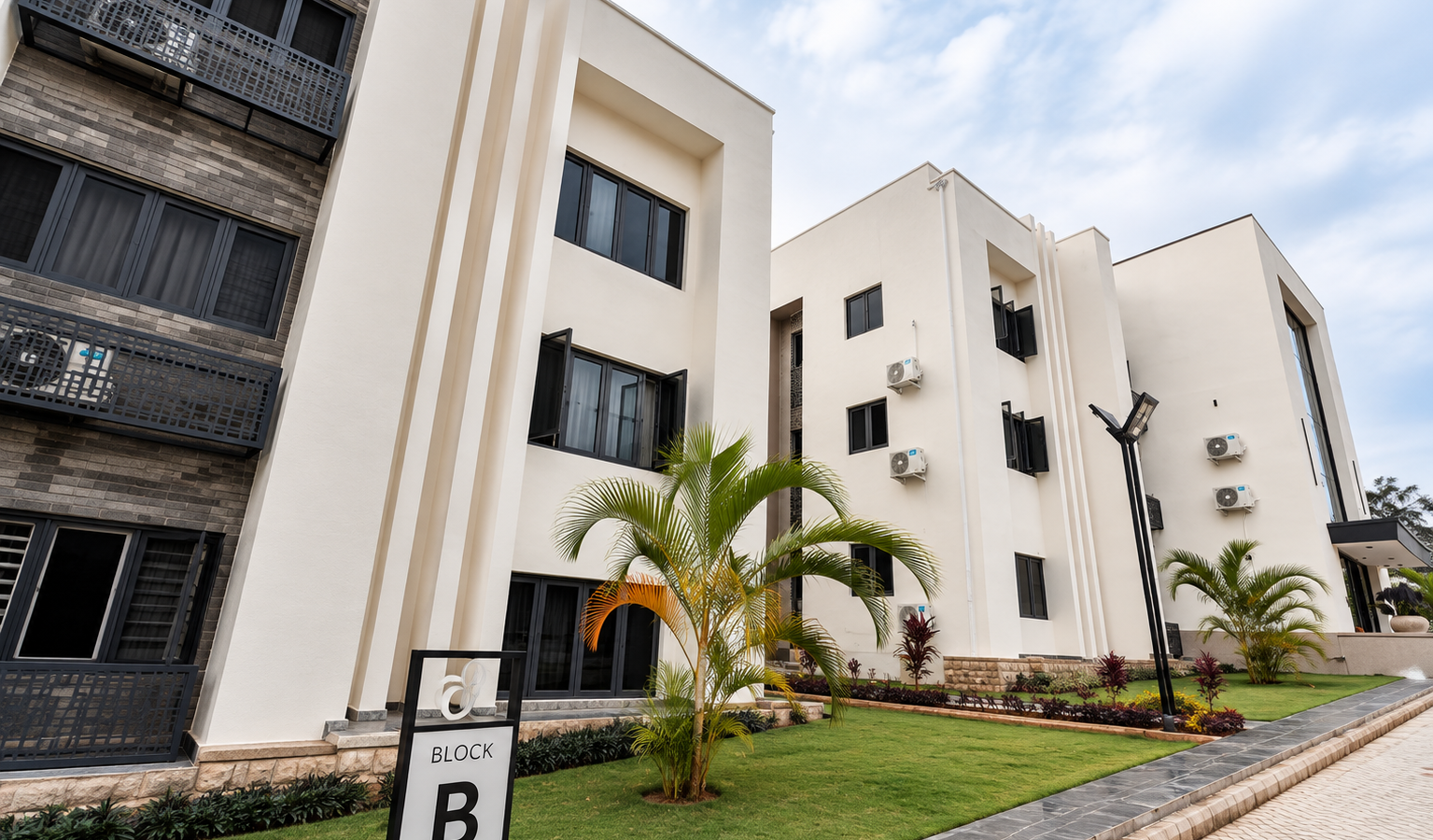 Sansa Residence — luxury serviced apartment complex exterior, Maitama Abuja